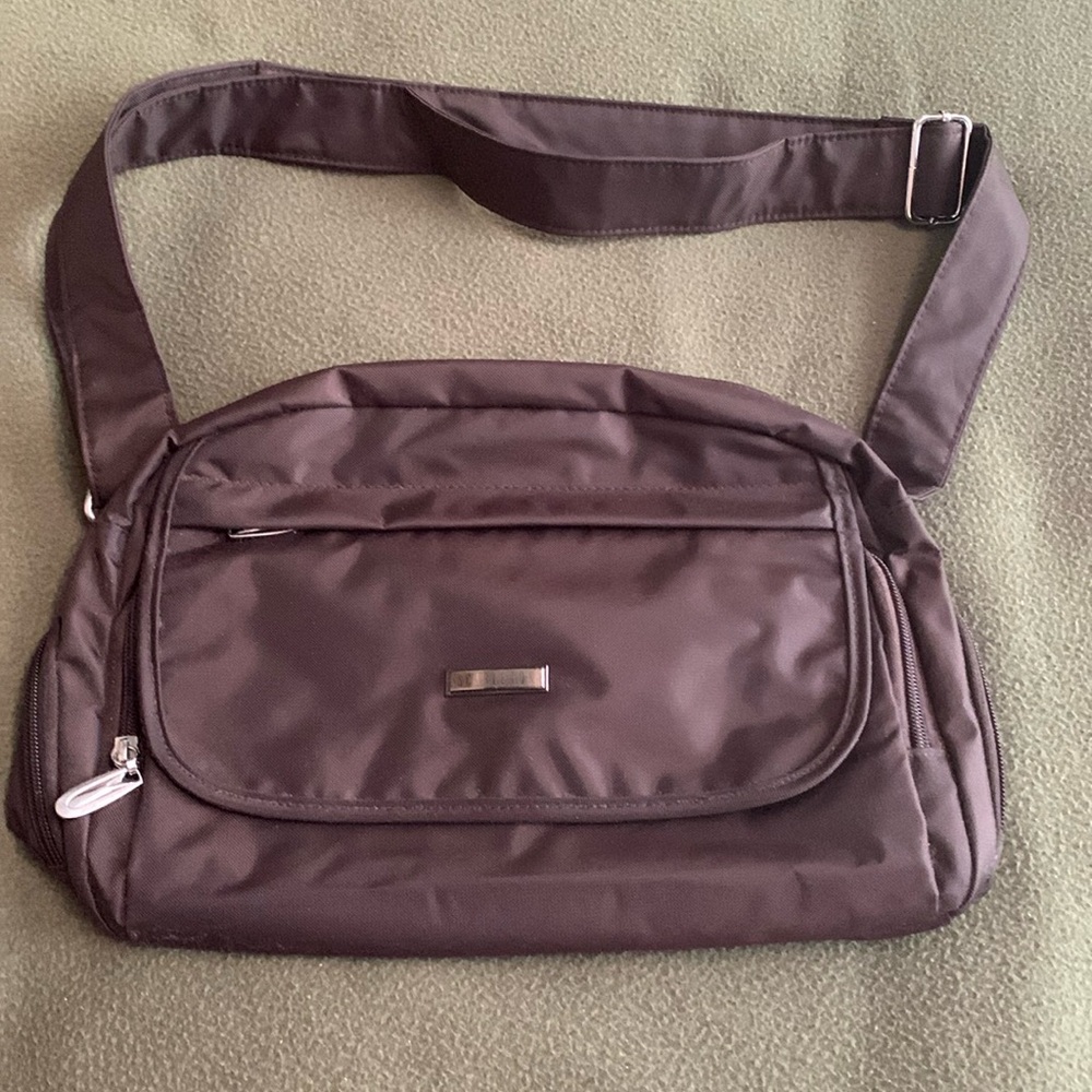 NWOT Scarleton brown vinyl bag.  Approx. 14 x 9..  Multiple zipper compartments
